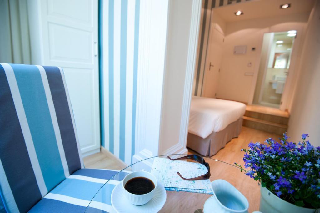 Kamer met 1 Groot Bed of 2 Aparte Bedden en Uitzicht op de Stad
